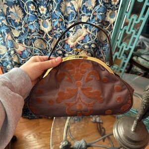 Elegant Brown Handbag with Gold Accents